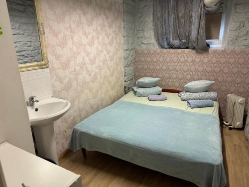 Postel nebo postele na pokoji v ubytování Süda Hostel