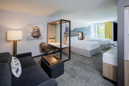 Postel nebo postele na pokoji v ubytování SpringHill Suites by Marriott Jackson Hole
