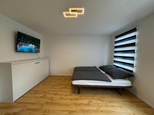 Postel nebo postele na pokoji v ubytování Große Wohnung mit XXl-Balkon in Schwerin Mitte