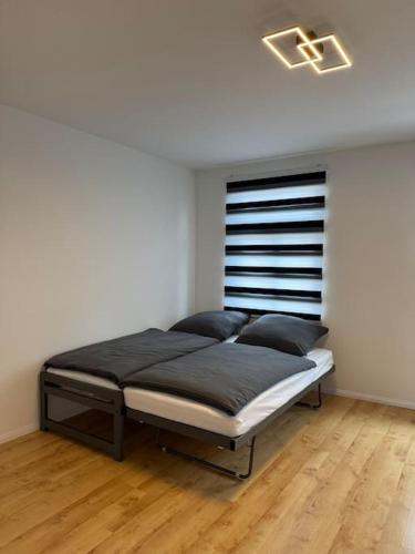Postel nebo postele na pokoji v ubytování Große Wohnung mit XXl-Balkon in Schwerin Mitte