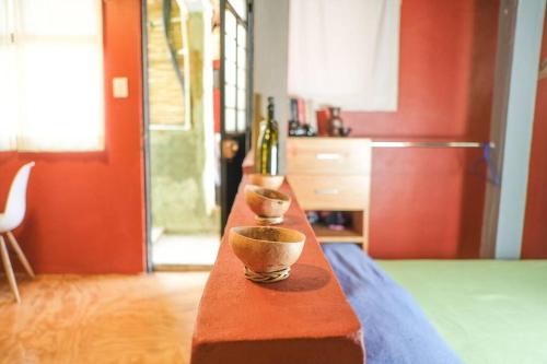 two bowls sitting on a counter in a kitchen at Laidback tradicional centric Wifi AC TV Terrace in Oaxaca City