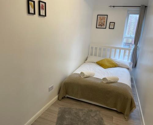 Postel nebo postele na pokoji v ubytování Seven Sisters Hideaway