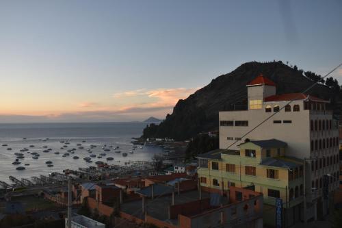a view of a harbor with boats in the water at Backpacker Nexus Mirasol in Copacabana