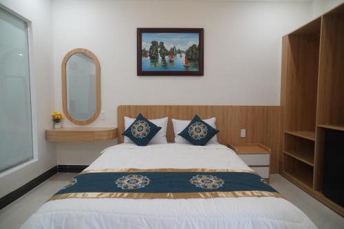 Ένα ή περισσότερα κρεβάτια σε δωμάτιο στο Queen Luxury Hotel Phan Rang
