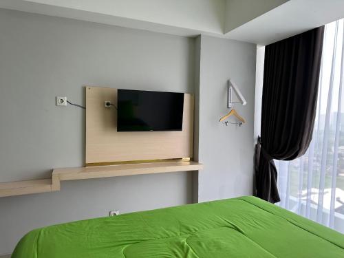 Televisyen dan/atau pusat hiburan di Nature INN Majestic Point Serpong