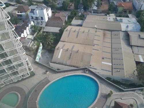 Kolam renang di atau dekat dengan Nature INN Majestic Point Serpong