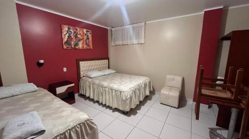 Katil atau katil-katil dalam bilik di Hostal Bahia Camaná