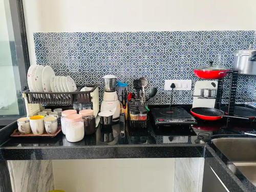 Η κουζίνα ή μικρή κουζίνα στο Lovely Couple friendly space to chill with Netflix