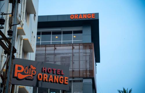 a building with a ripp hotel orange sign on it at Hotel Orange in Bhubaneshwar