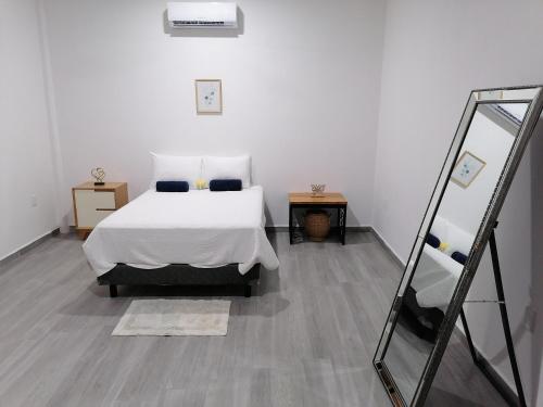 Postel nebo postele na pokoji v ubytování Casa BOSQUE LUCIERNAGAS