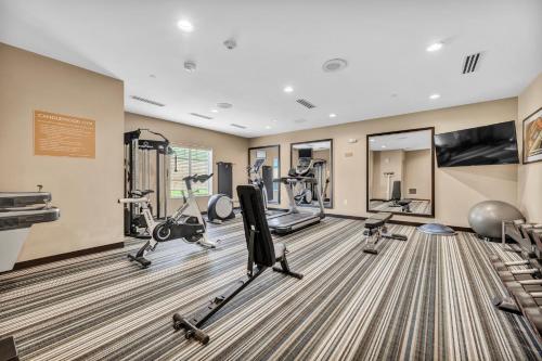 a fitness room with treadmills and exercise machines at Candlewood Suites - Dumfries - Quantico by IHG in Dumfries