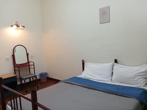 Ένα ή περισσότερα κρεβάτια σε δωμάτιο στο Seri Bulan Condo