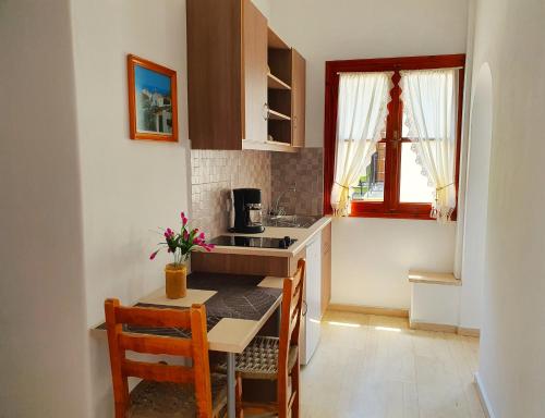 Kuchyň nebo kuchyňský kout v ubytování Nina Apartments