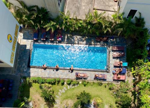 an overhead view of a swimming pool at a resort at Catba Buffalo Hostel in Cat Ba