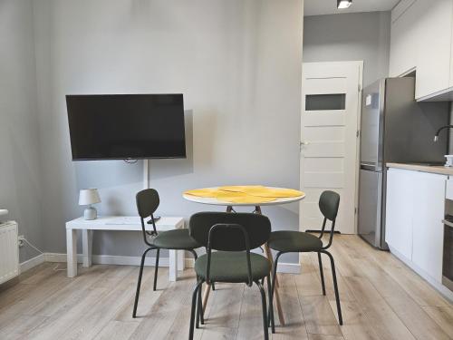 Televízia a/alebo spoločenská miestnosť v ubytovaní Urban Jungle - Grey Apartment
