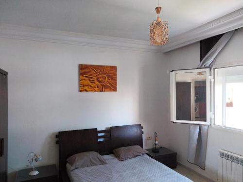 Postel nebo postele na pokoji v ubytování Appartement Entier à 2 min de la plage