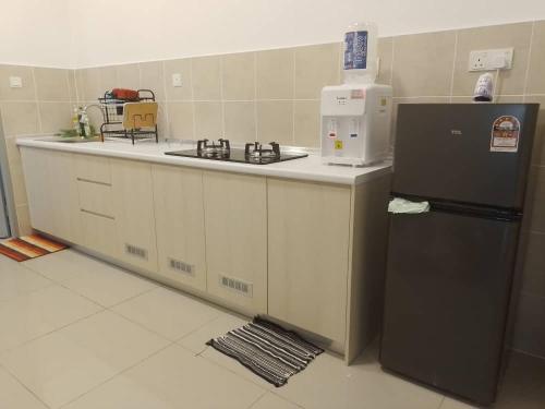 Dapur atau dapur kecil di RAISHa HOMESTAY