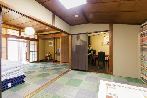 a living room with a colorful floor at -W- Vacation Rental in Nagoya
