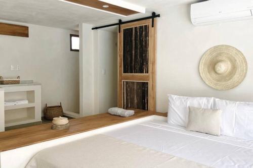 Ένα ή περισσότερα κρεβάτια σε δωμάτιο στο Mahalo Villa Palmera Private Pool