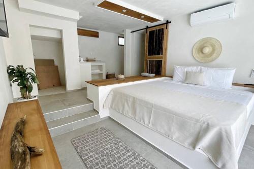 Ένα ή περισσότερα κρεβάτια σε δωμάτιο στο Mahalo Villa Palmera Private Pool