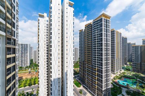 an aerial view of tall buildings in a city at Masteri Centre Point - Vihomes serviced apartment in Long Bình