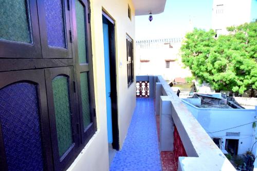 a hallway of a building with a view of a street at Hotel Moon Light in Pushkar