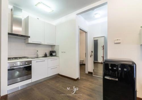 Η κουζίνα ή μικρή κουζίνα στο Appartamento Ponte Vecchio - M&M Holiday House