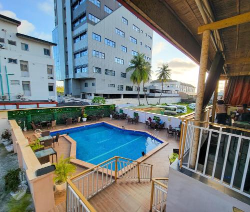 an overhead view of a swimming pool on a building at Presken Hotels @ Victoria Island in Apese