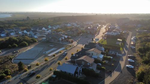 an aerial view of a residential neighborhood with houses at Sunset Beach Manor - Oyhut Bay Seaside Village in Ocean Shores