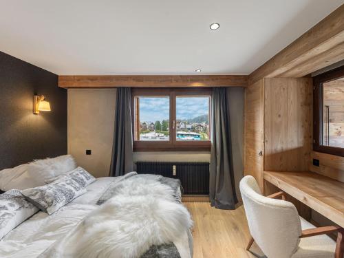 Posteľ alebo postele v izbe v ubytovaní Duplex lumineux à Megève, proche télécabine du Jaillet, 2 chambres en suite, parking, casier à ski - FR-1-569-77