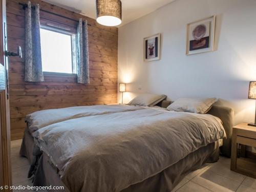 En eller flere senge i et værelse på Appartement aux Arcs 1800 - 6 pers, parking, wifi - FR-1-352-18