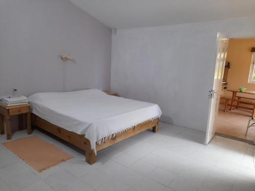 Katil atau katil-katil dalam bilik di Keravel Bungalows