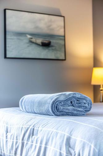 Una cama o camas en una habitación de Motel le Point de Vue