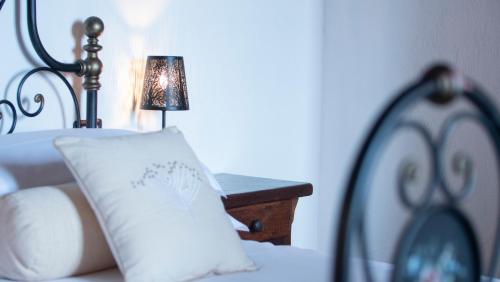 Postel nebo postele na pokoji v ubytování I Salici Agriturismo