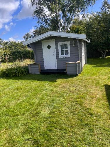 Taman di luar Skördevägen plats för 2familjer i skummeslövstrand
