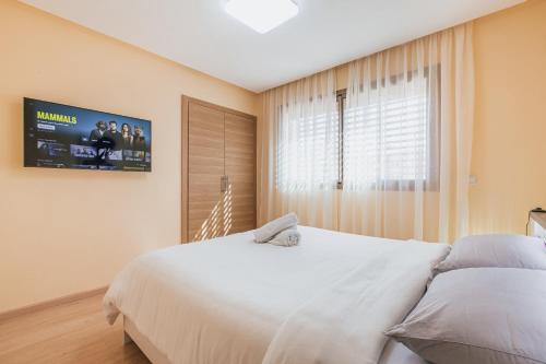 Postel nebo postele na pokoji v ubytování Migdal Gueliz Apart Hôtel