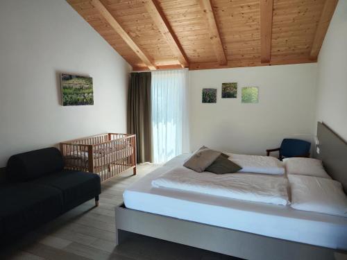 Postel nebo postele na pokoji v ubytování 8 Grappoli Agritur