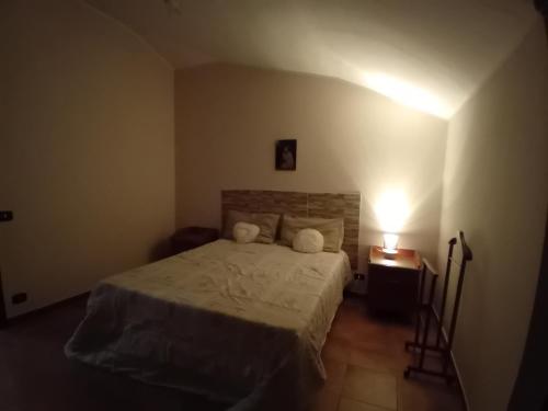 Ένα ή περισσότερα κρεβάτια σε δωμάτιο στο Luna Reale Relais e Suite