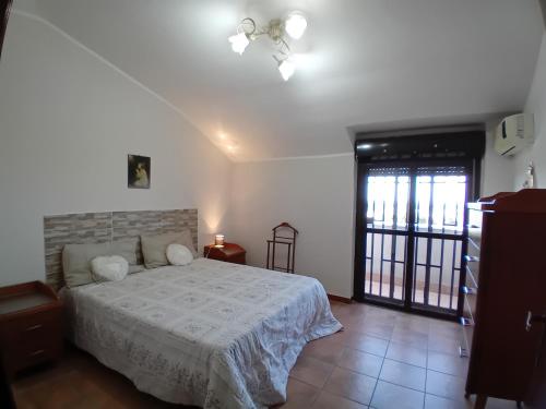 Ένα ή περισσότερα κρεβάτια σε δωμάτιο στο Luna Reale Relais e Suite
