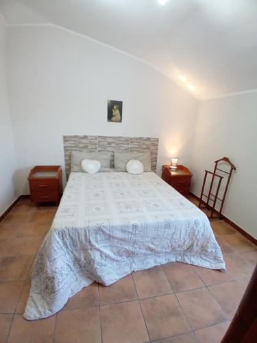 Ένα ή περισσότερα κρεβάτια σε δωμάτιο στο Luna Reale Relais e Suite