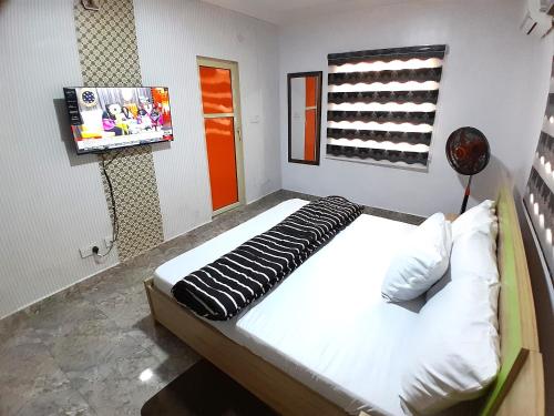 Ένα ή περισσότερα κρεβάτια σε δωμάτιο στο MQ Apartments - Stylish 3 bedrooms Flat
