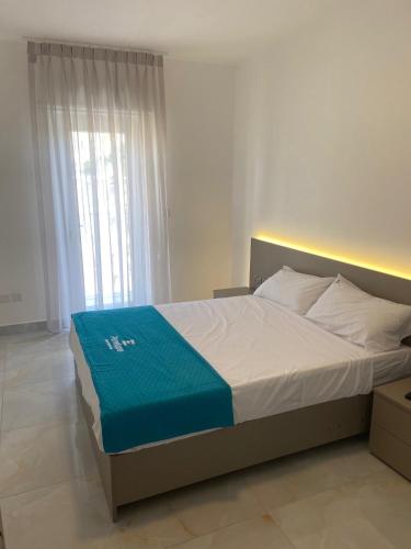 Ένα ή περισσότερα κρεβάτια σε δωμάτιο στο Penelope Apartments, Apartment 14
