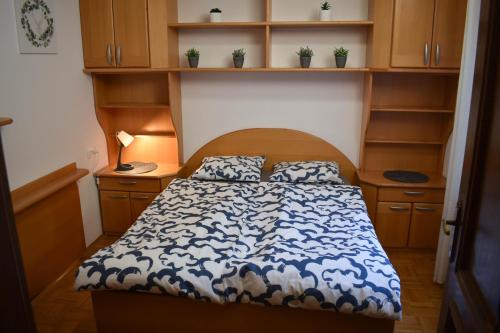 Ένα ή περισσότερα κρεβάτια σε δωμάτιο στο Lampino apartment