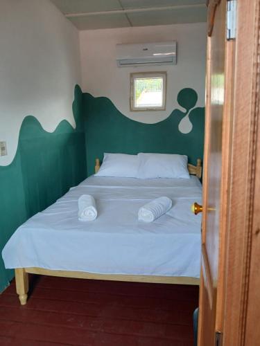 Postel nebo postele na pokoji v ubytování Casa mosaico