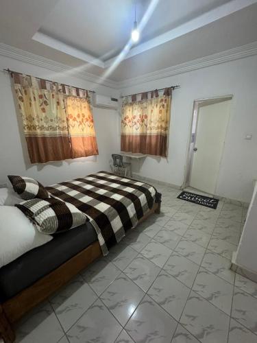 Postel nebo postele na pokoji v ubytování Casa Excelsior Brusubi