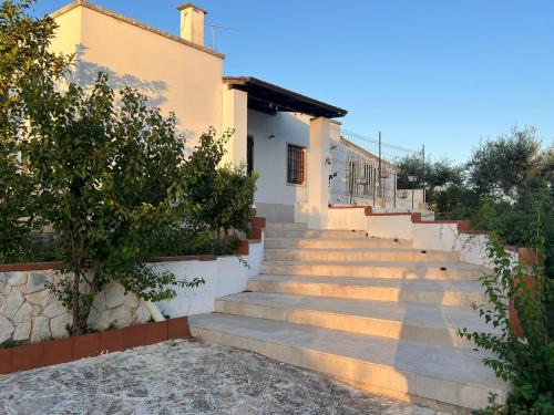 a set of stairs in front of a house at Casa vacanze La Campanella in Putignano
