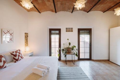 Ένα ή περισσότερα κρεβάτια σε δωμάτιο στο Romantic Duplex with terrace and great views