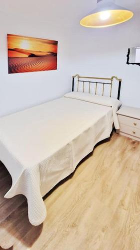 Cama o camas de una habitación en Céntrico y amplio piso en Béjar