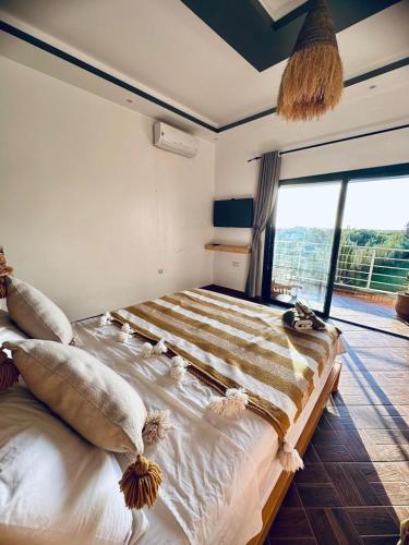 Ένα ή περισσότερα κρεβάτια σε δωμάτιο στο Villa azure