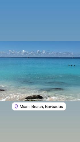 a view of the ocean from a beach in barbados at Chandler Homestay in Saint Philip